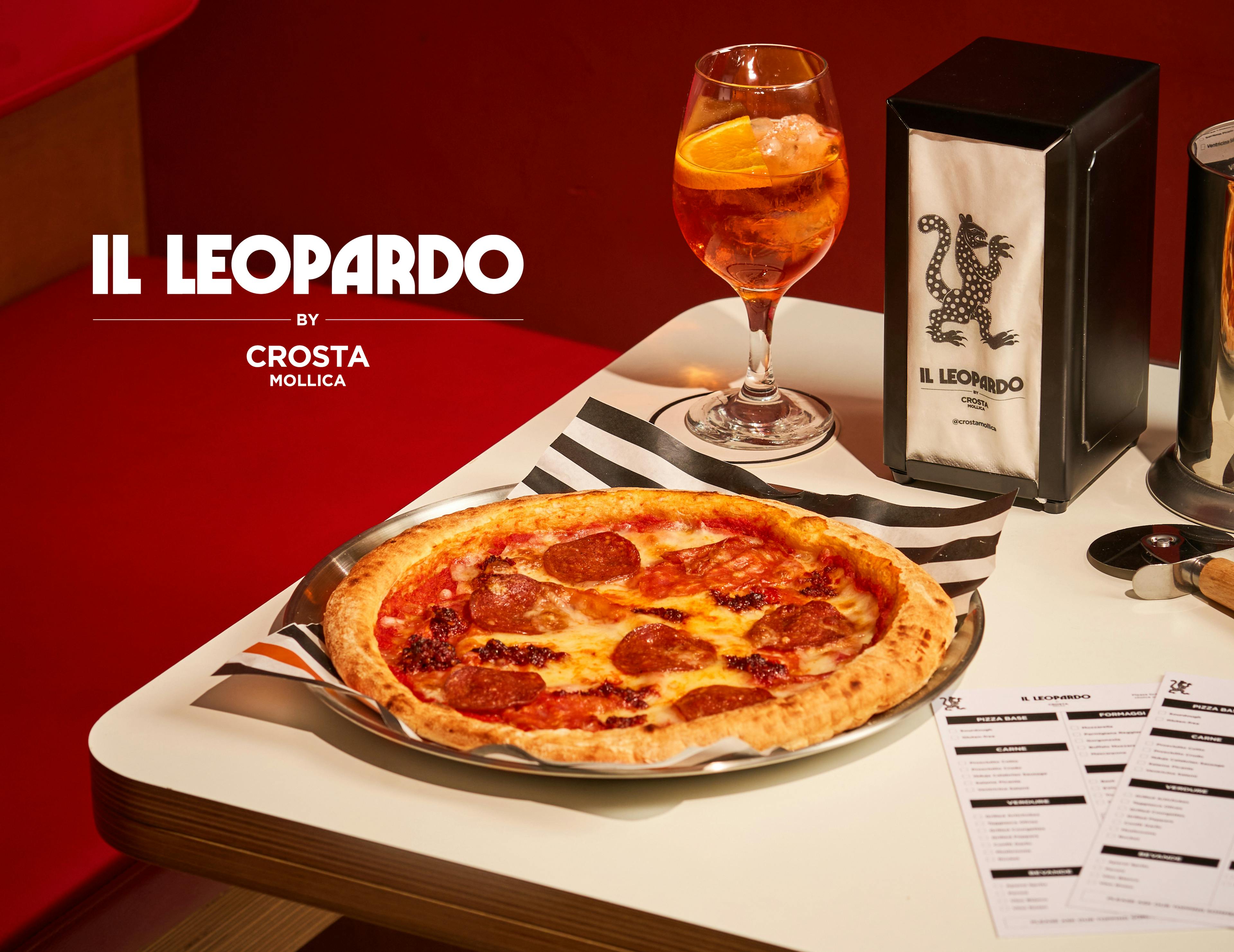 Il Leopardo Pizzeria pop up by Crosta Mollica. Italian pizza on a table.