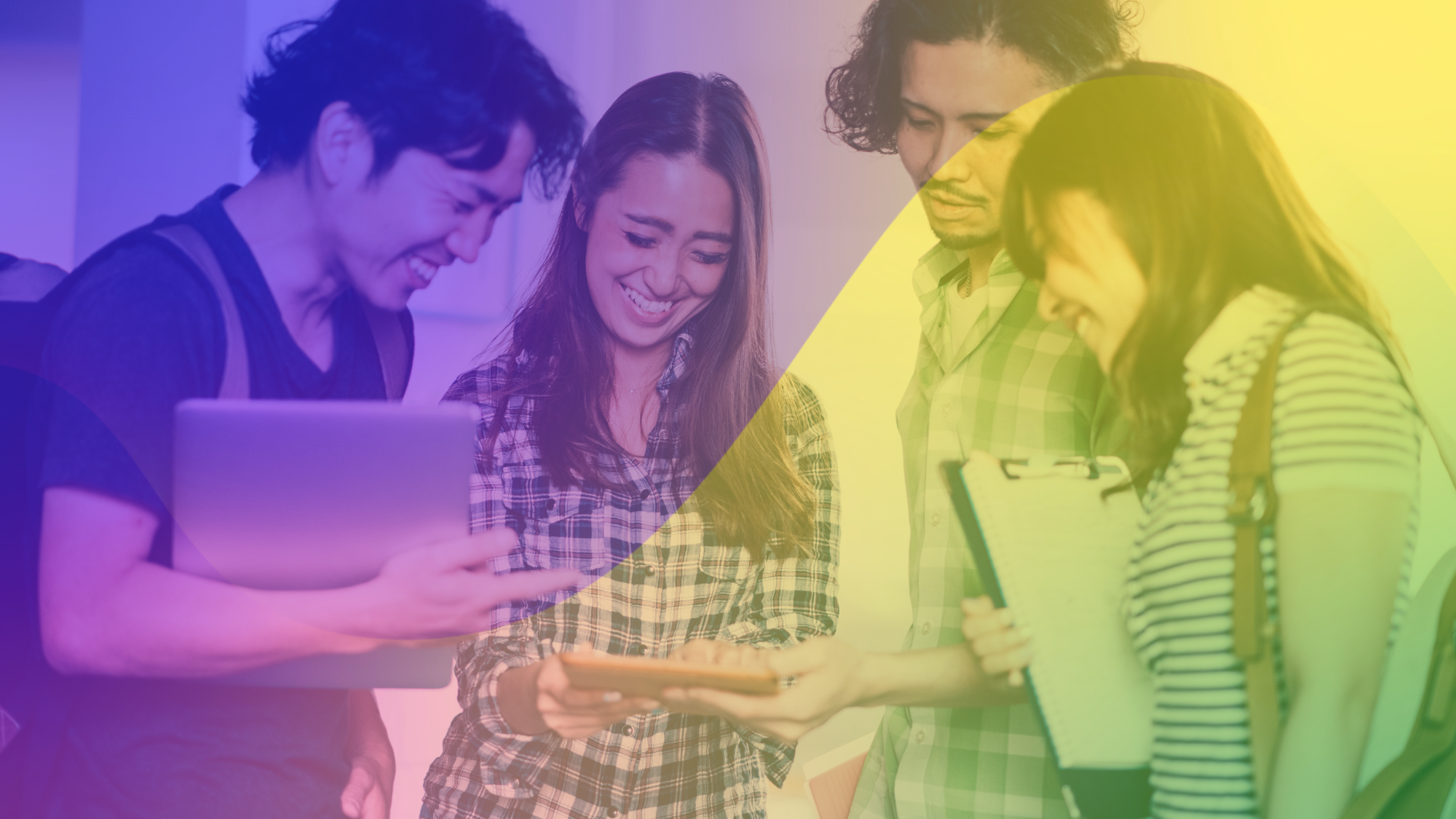 Students smiling, accessing their exam results, looking at a smart tablet.