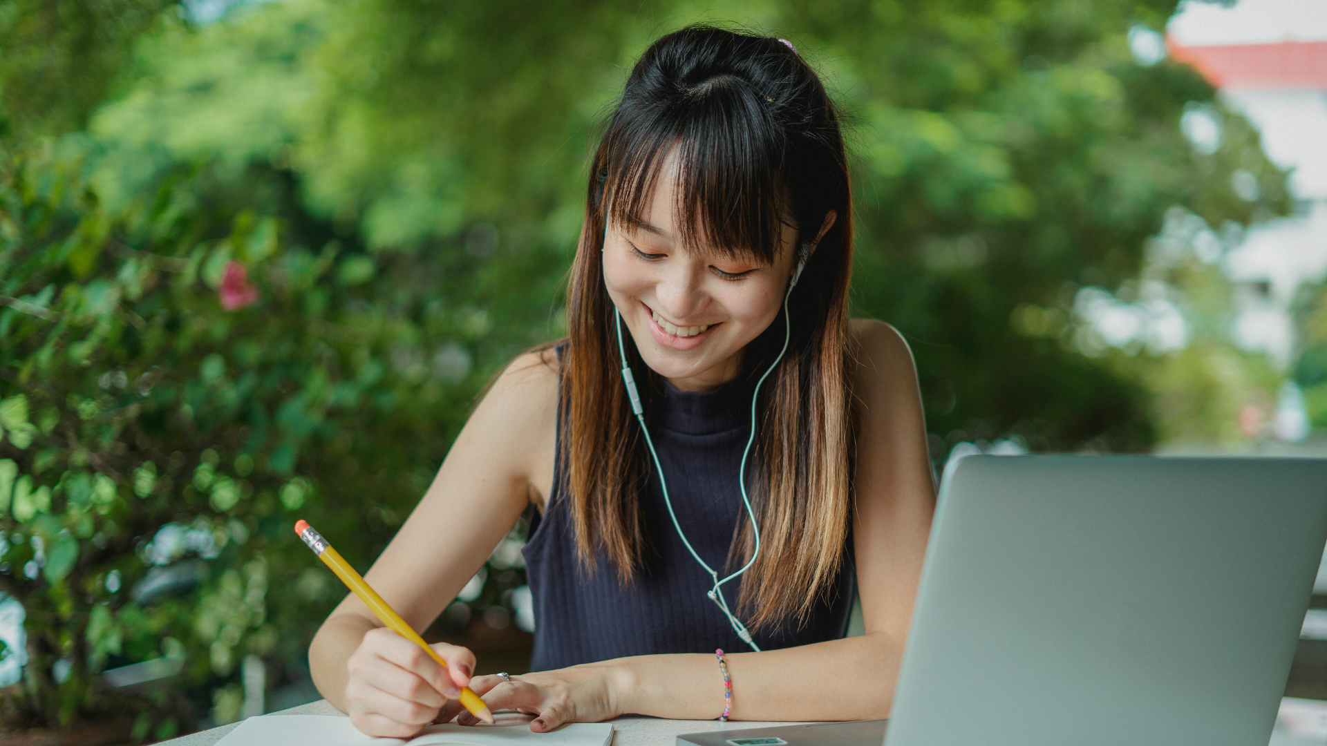 Girl on laptop smiling