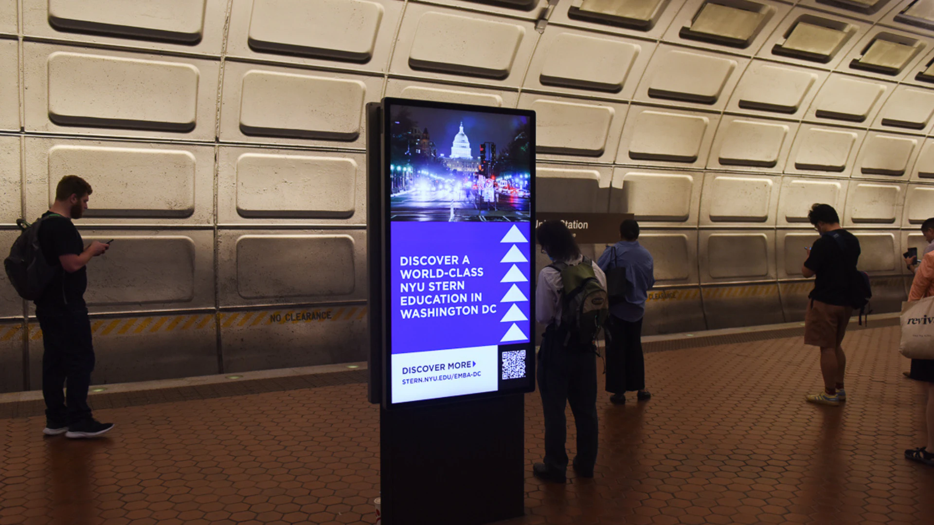 Ad in subway that reads - Discover world-class NYU STERN Education in Washington DC