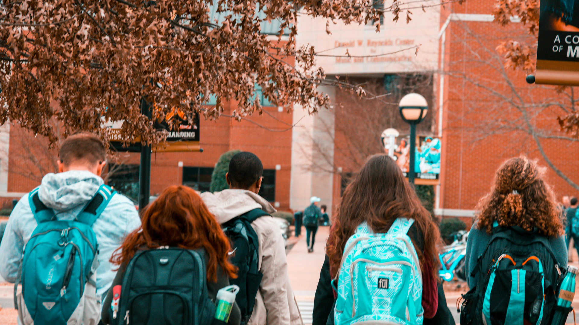 college students walking around campus 
