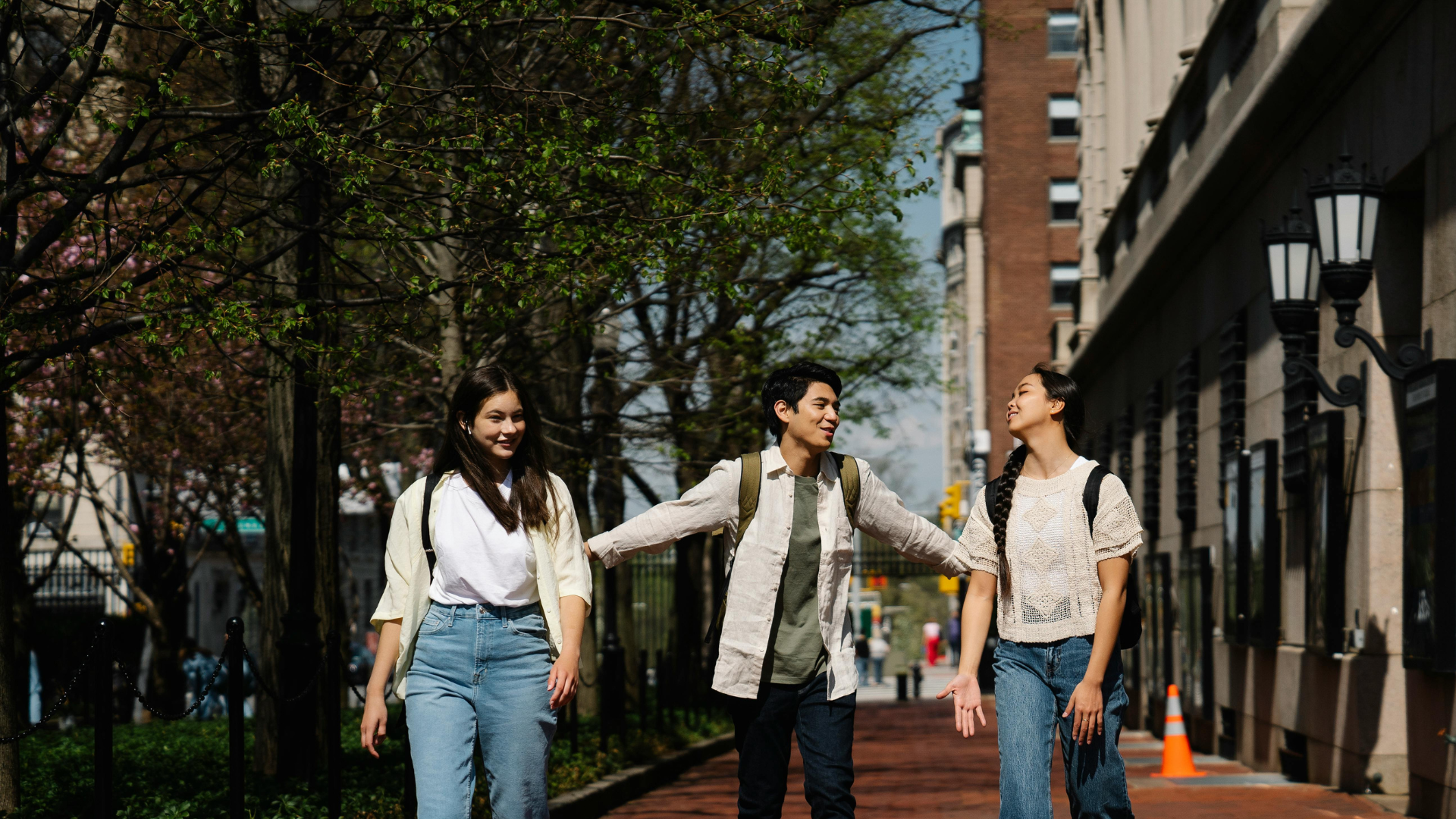3 students walking together