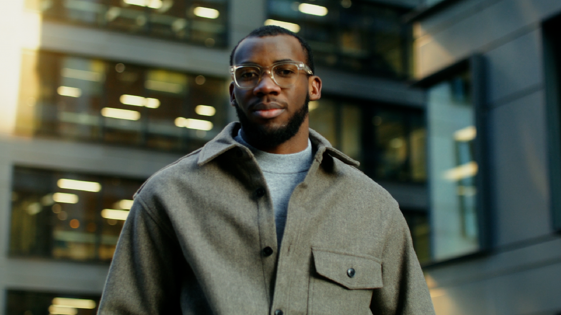 Man standing in front of a building