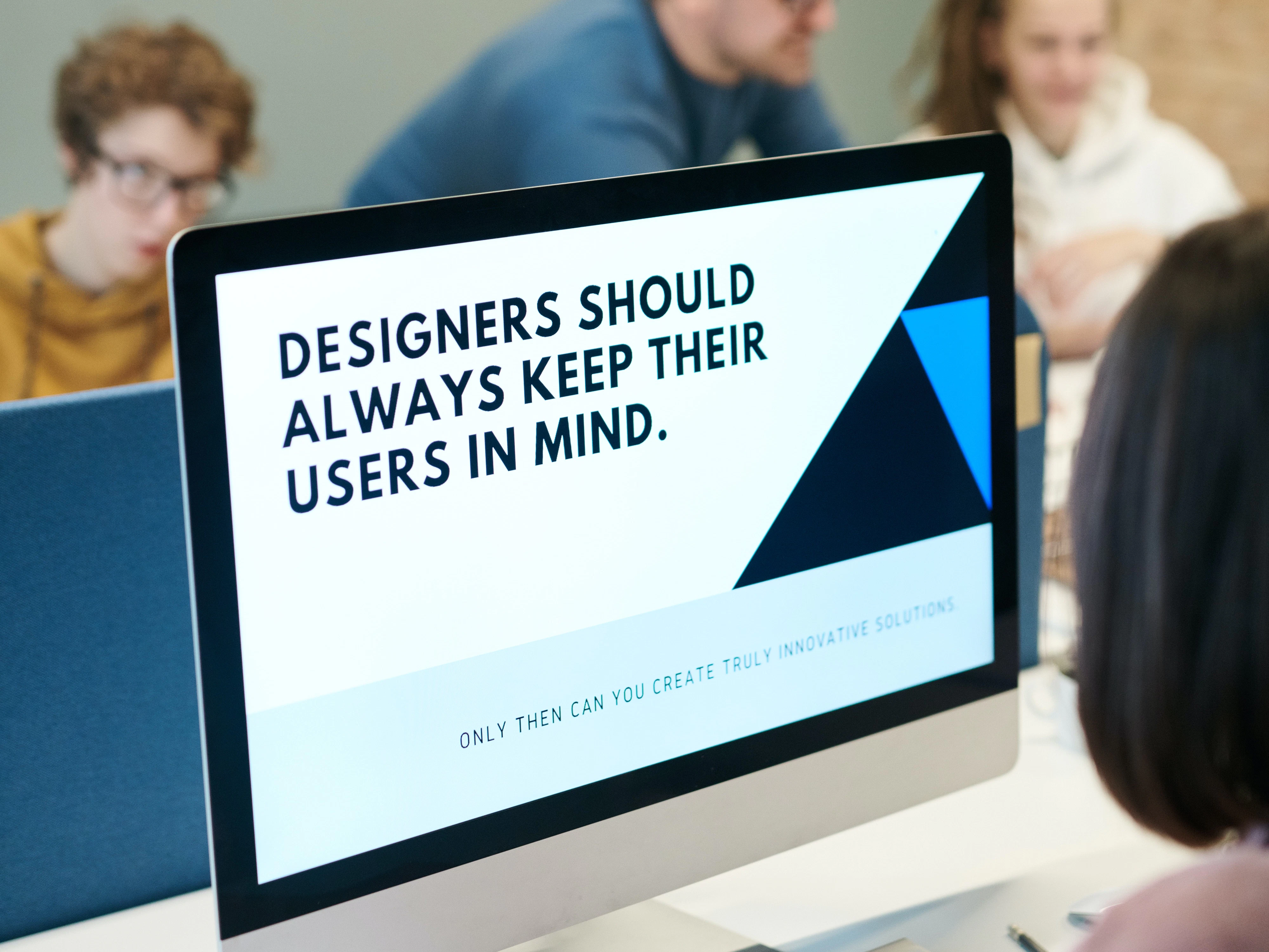 a computer screen that says "designers should always keep their users in mind."